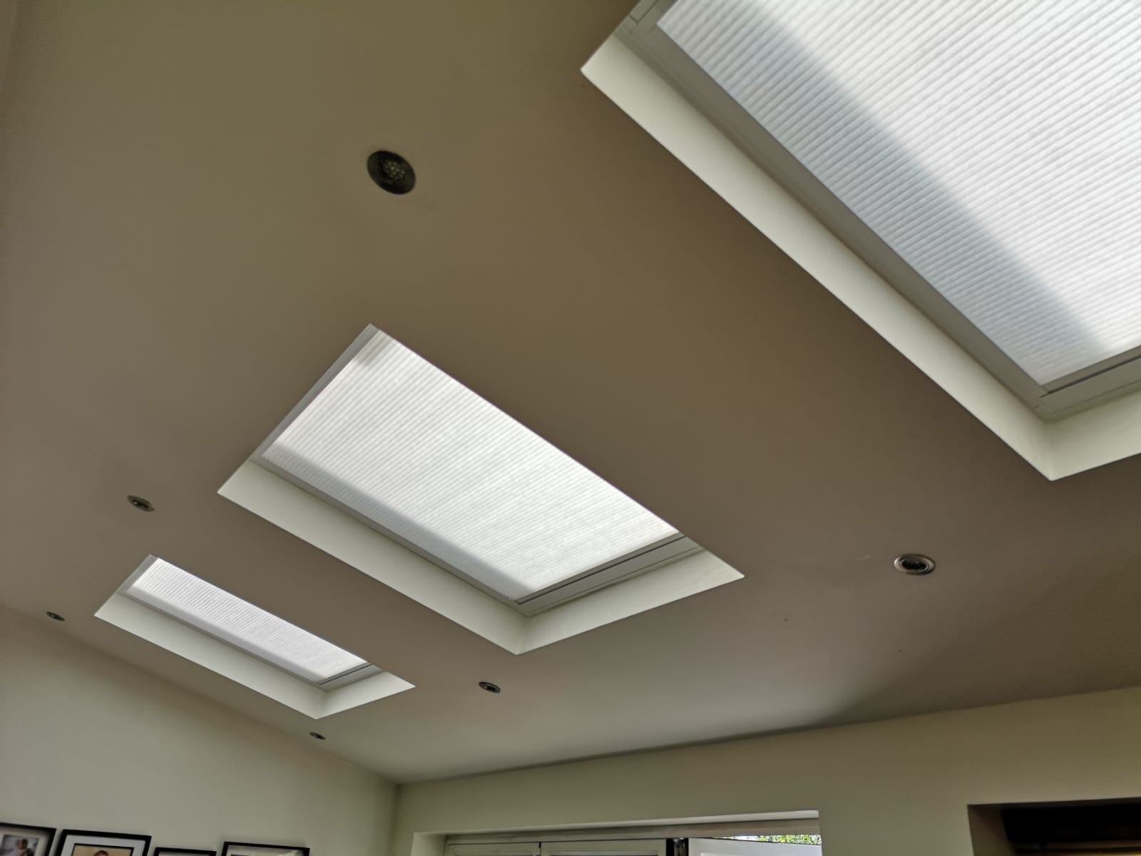 Three Velux roof windows with made to measure pleated blinds