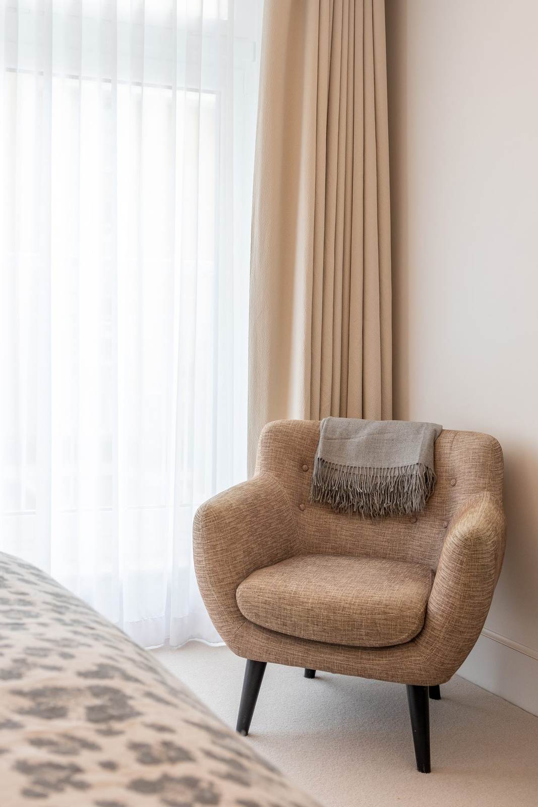 Bedroom curtains and bedside lighting
