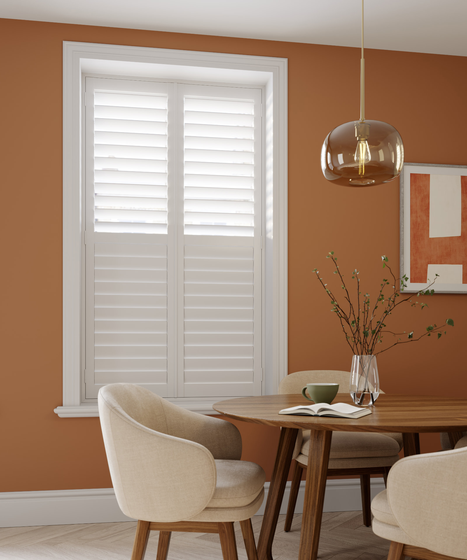 Snow white full height shutters with 89mm louvres in a terracotta dining room