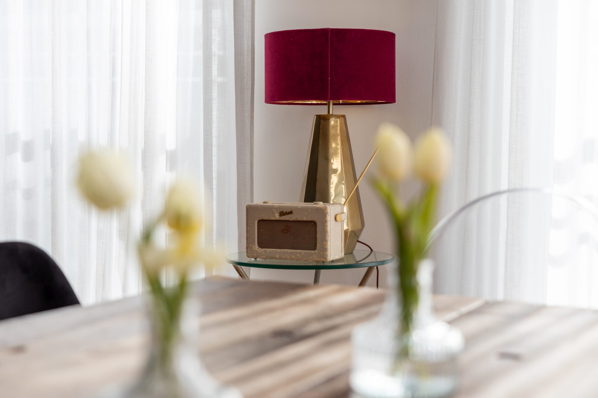 Full-length curtains beside a living room window