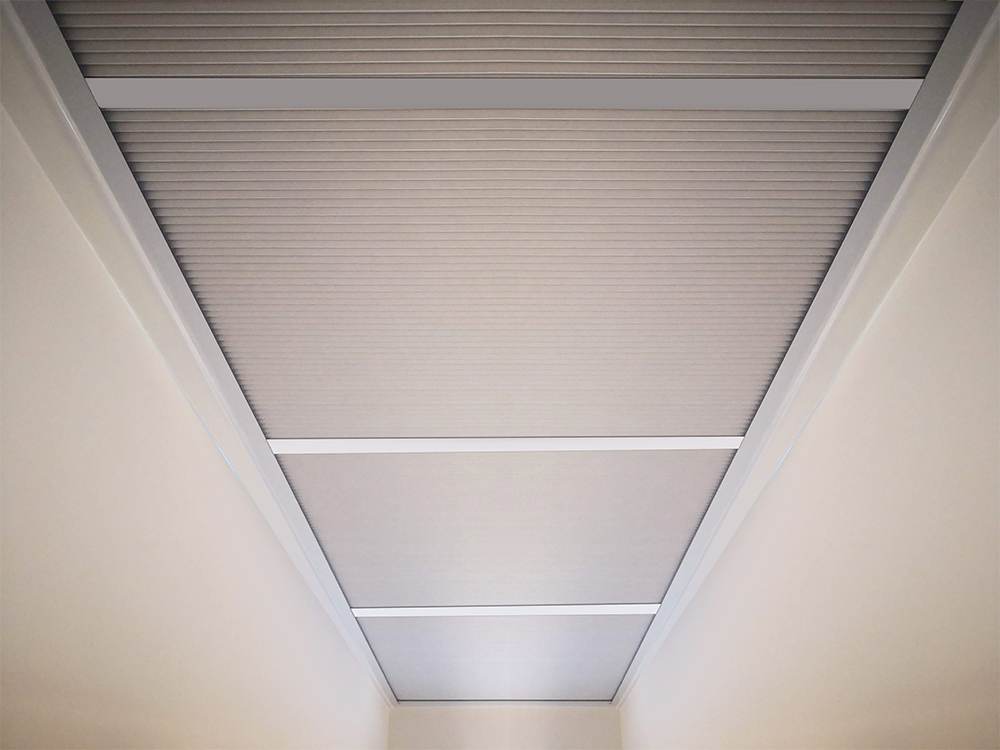 Cellular skylight blind fitted across a kitchen roof lantern