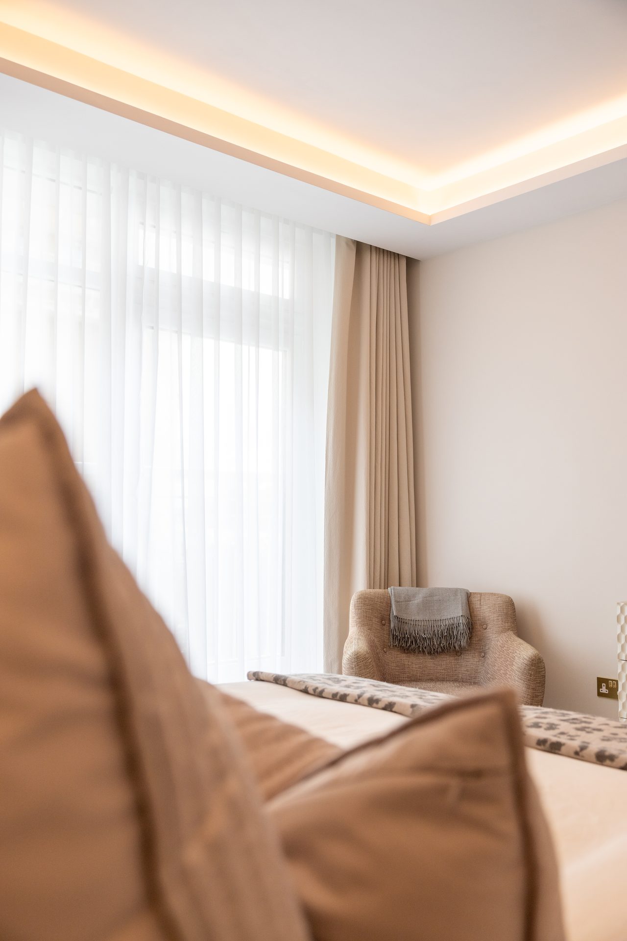 Bedroom curtains and dressing area detail